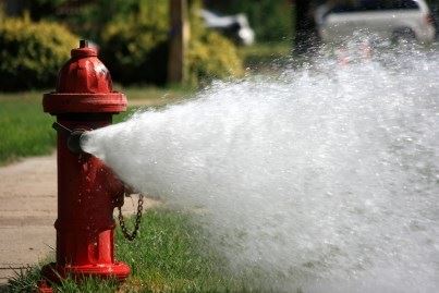 Water hydrant with water gushing out